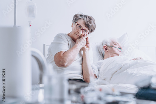 Loving wife at hospital bed