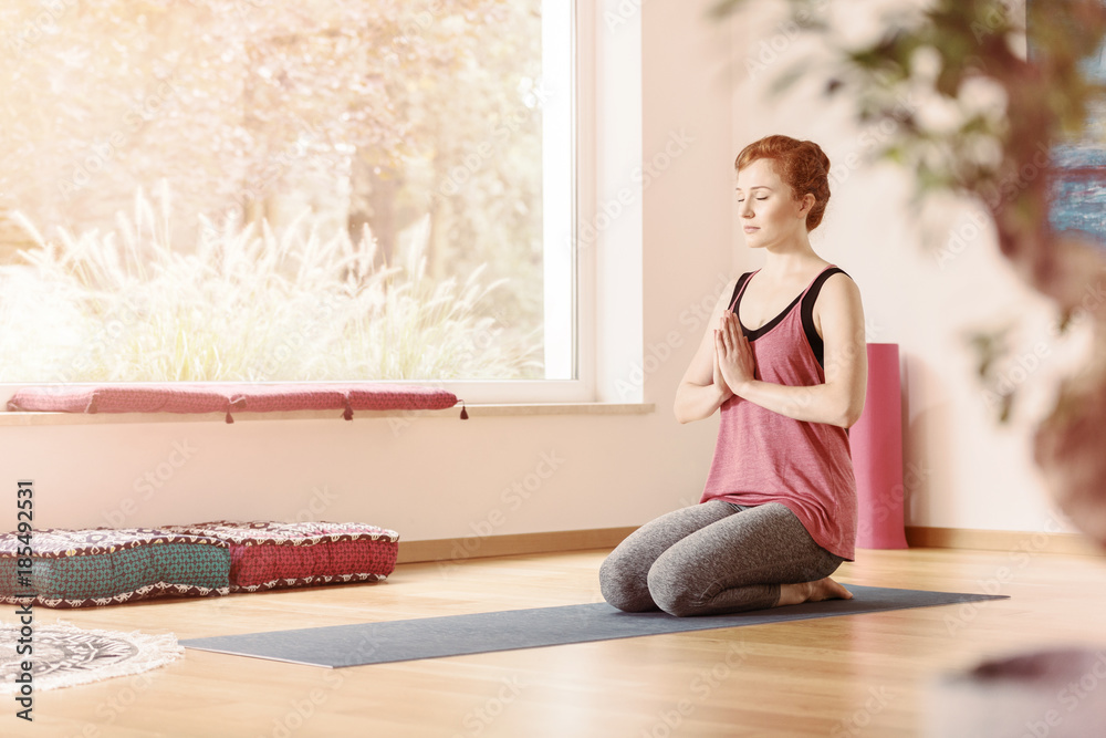 Relaxed woman in yoga center Relaxed woman in yoga center