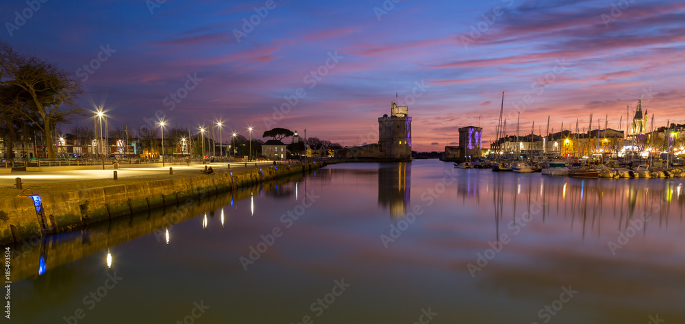 Naklejka premium La Rochelle - Harbor by night with beautiful sunset