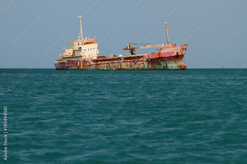 Waterlogged vessel in sea. Grenada