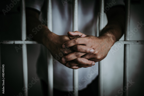 Canvas Print Hands of men desperate to catch the iron prison,prisoner concept,thailand people,Hope to be free