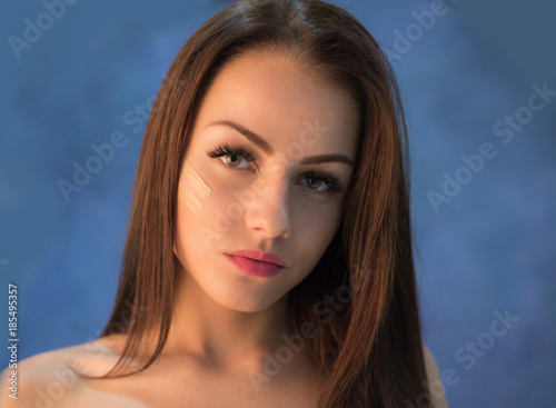 Attractive young woman portrait in studio