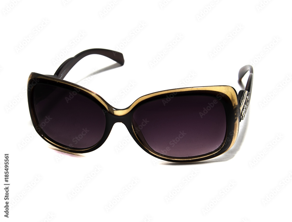 Sunglasses worn in the summer tanning by the sea Sunglasses worn in the summer tanning by the sea