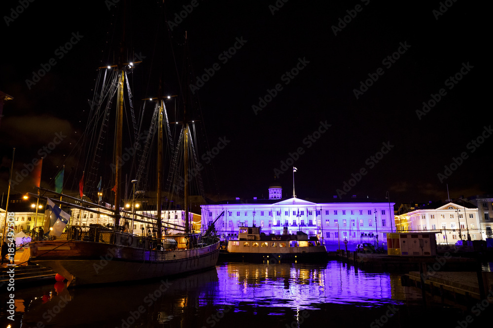 Helsinki city hall and sailing ship at night