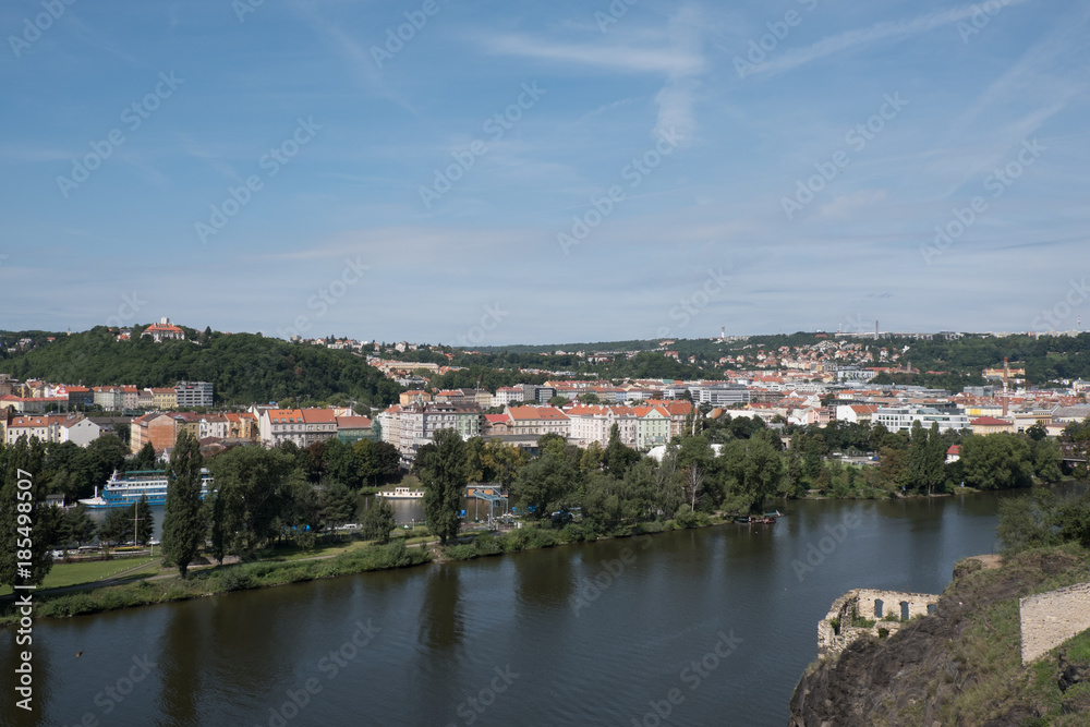 View of Prague and the Vltava River from Vysehrad. Looking out over Prague from above on a summer's day,
