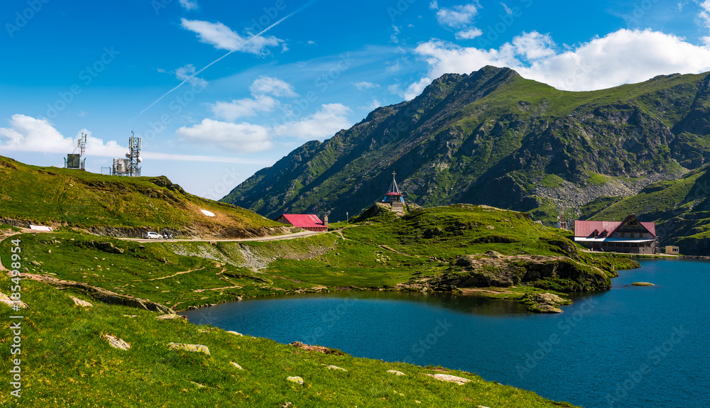 Transfagarasan road, Romania - Jun 26, 2017: lake Balea in Fagaras mountains on a bright sunny day. amazing summer landscape of one of the most visited landmarks in Romania