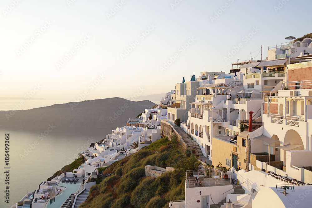 View of the town of Imerovigli at sunset in Santorini island, Greece