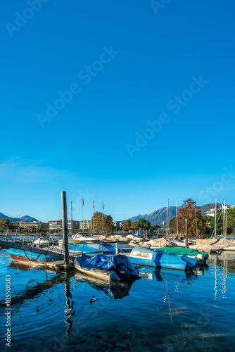 Vertical Picture Of Boats Pier in Danube River Vienna, Austria © Aris Suwanmalee