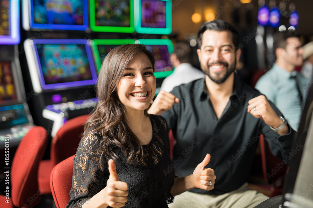 Couple having some fun in a casino Couple having some fun in a casino