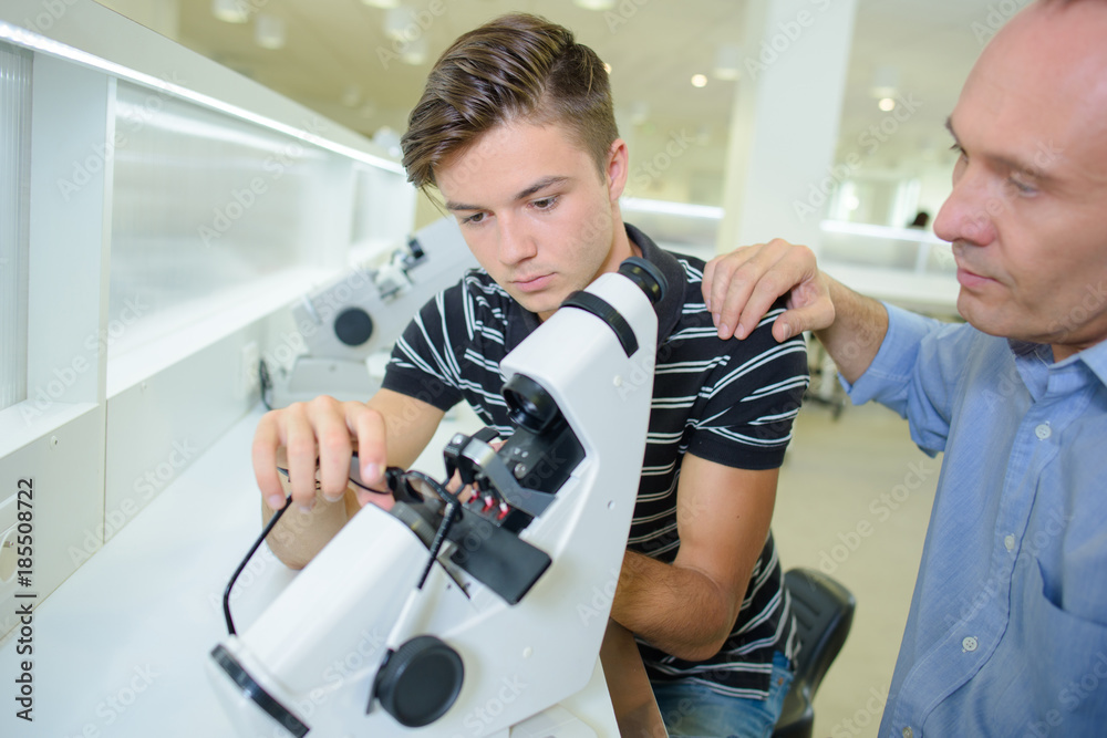 Fototapeta premium ophtalmologist and his intern