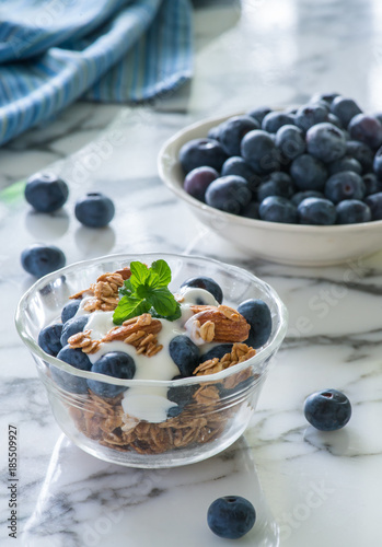 blueberry bowl glass marble granola napkin table yogurt