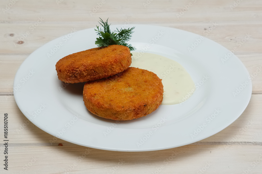 Vegetarian cutlet and sauce. Vegetarian food without meat. A healthy meal for slimness. Vegetarian cutlet and sauce. Vegetarian food without meat. A healthy meal for slimness.