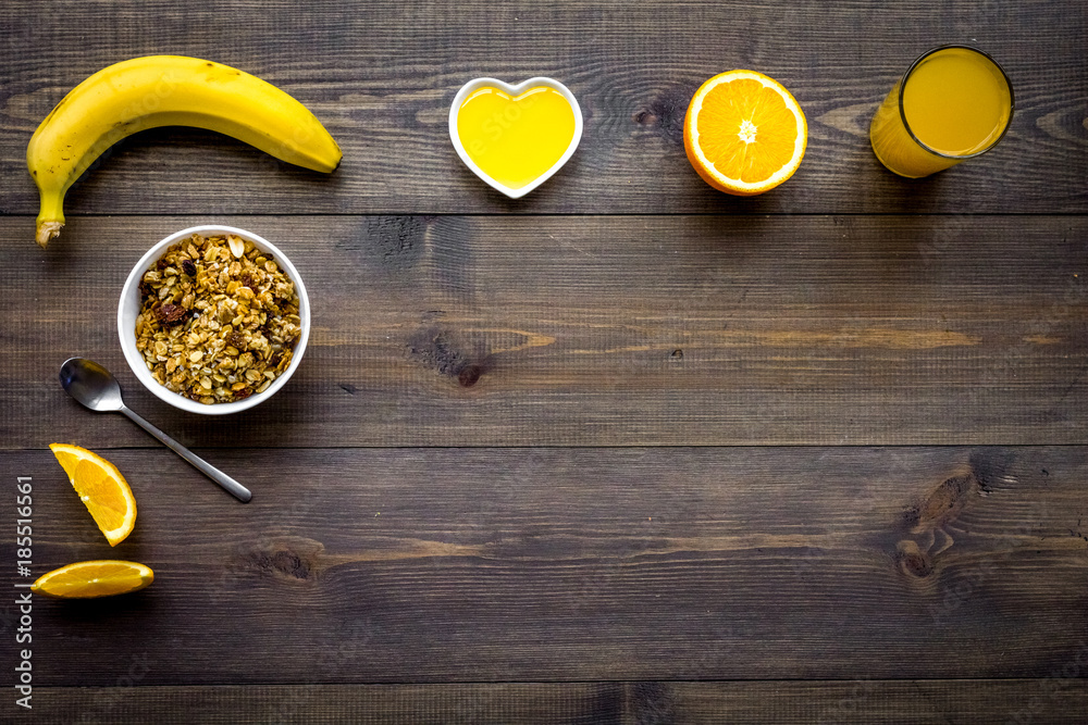 Healthy breakfast. Porridge with fruits and fresh juice. Dark wooden background top view copyspace Healthy breakfast. Porridge with fruits and fresh juice. Dark wooden background top view copyspace