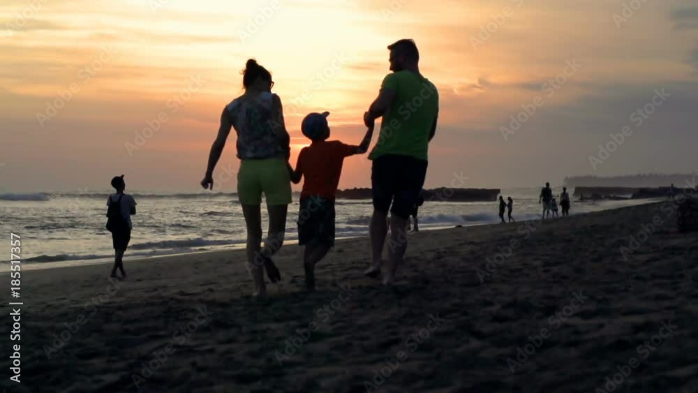 Family having fun on the beach during sunset, steadycam shot, slow motion shot
Family having fun on the beach during sunset, steadycam shot, slow motion shot