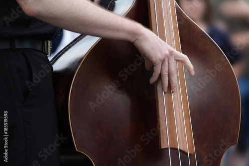 close up of a jazz musician playing double bass