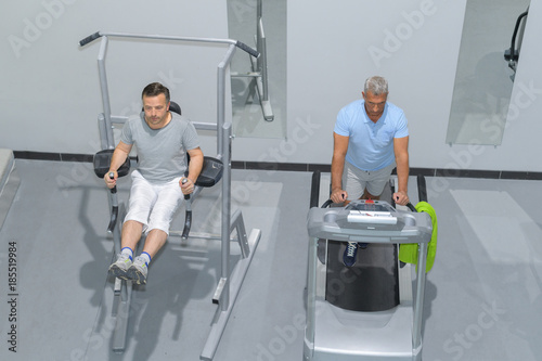 men exercising in the gym