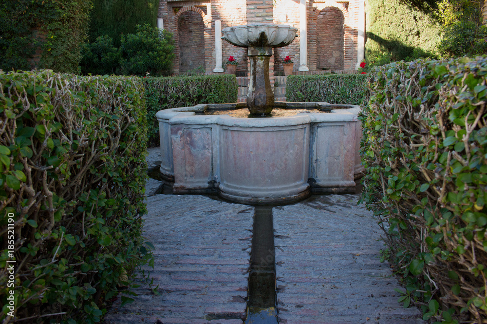 Fountain. Ancient Arabic fountain. Alcazaba of Málaga, Andalusia, Spain.