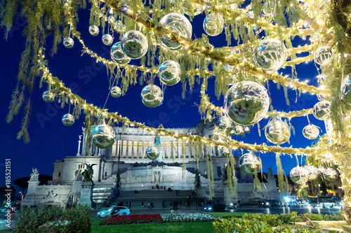 Piazza Venezia with Christmas lights and decorated tree.