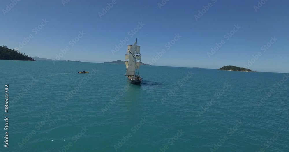 WHITSUNDAY ISLANDS – FEBRUARY 2016 : Aerial shot of Solway Lass ship / sailboat on a beautiful day with open ocean in view WHITSUNDAY ISLANDS – FEBRUARY 2016 : Aerial shot of Solway Lass ship / sailboat on a beautiful day with open ocean in view