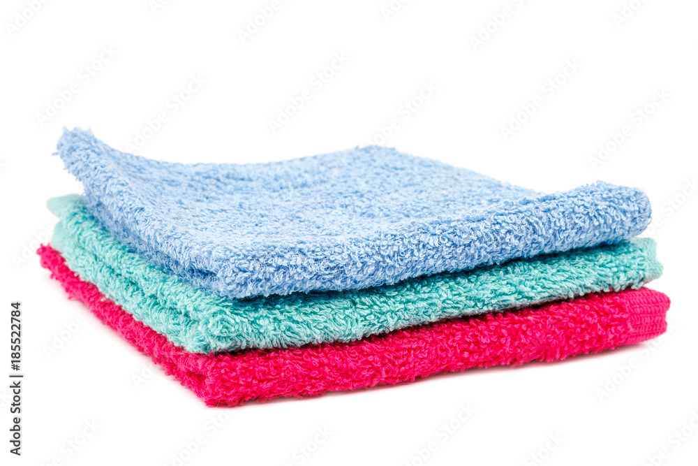 Stack of towels isolated on a white background. Stack of towels isolated on a white background.
