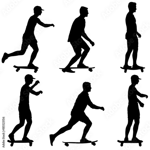 Set ilhouettes a skateboarder performs jumpingon a white background