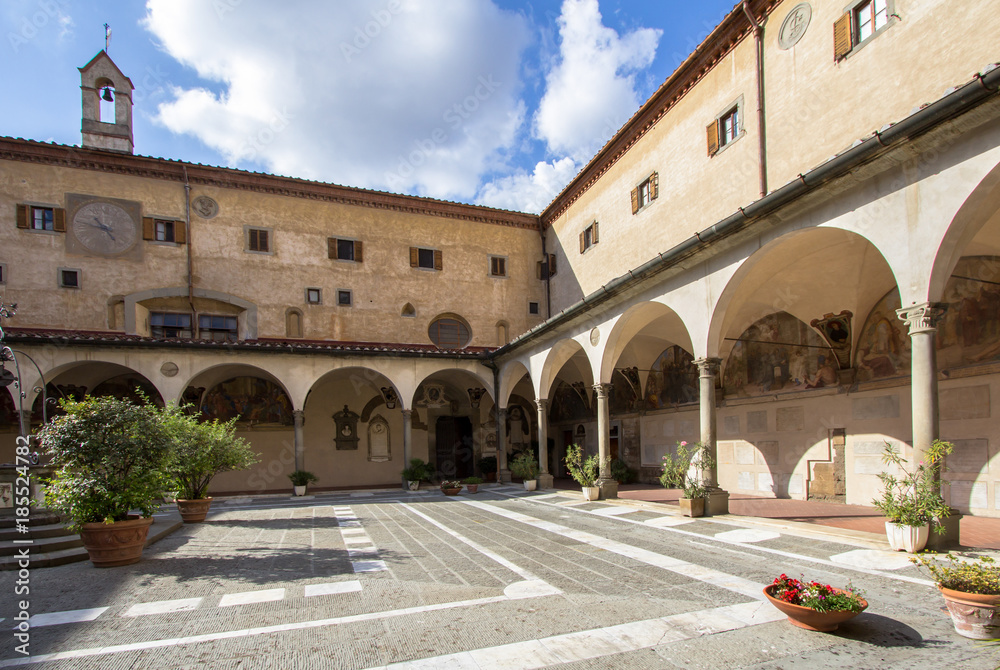 Exterior view (Courtyard) of the Basilica della Santissima Annunziata in Florence, Tuscany, Italy