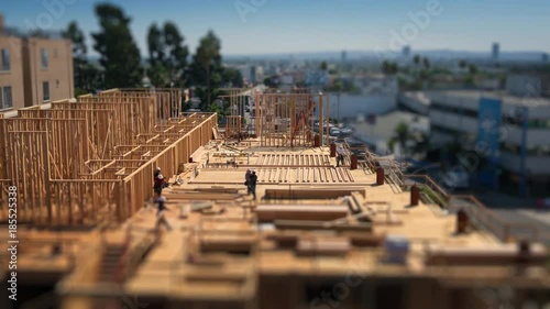 Workers building construction site Los Angeles Tilt shift city timelapse 4K
