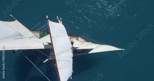 WHITSUNDAY ISLANDS – FEBRUARY 2016 : Aerial shot of Solway Lass ship / sailboat on a beautiful day with open ocean in view photo