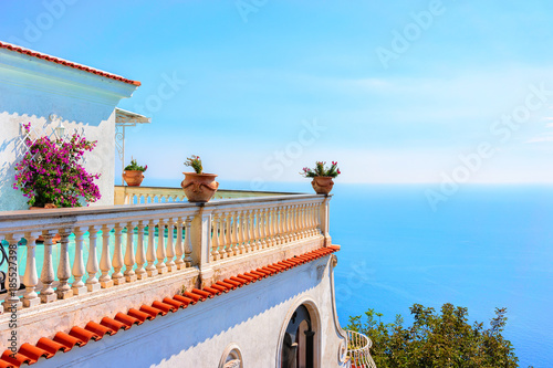 Balcony with flowers and Tyrrhenian sea in Nocelle photo