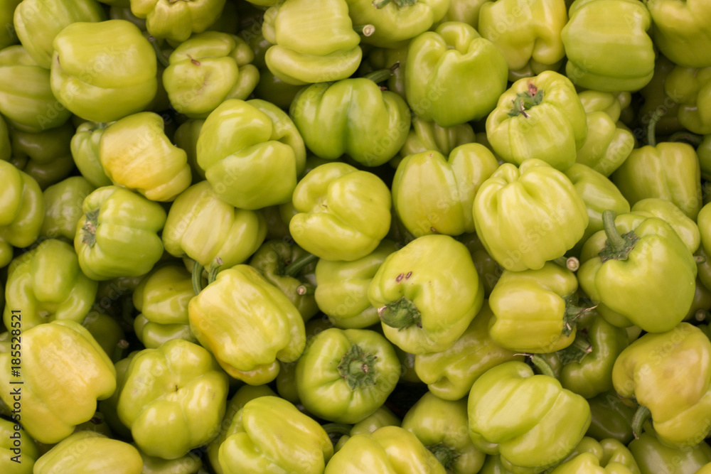 Fresh Green Bell Peppers Heap on Market Stall For Sale Fresh Green Bell Peppers Heap on Market Stall For Sale