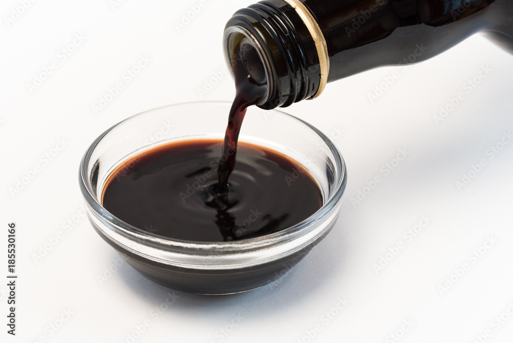 Ταπετσαρία Pouring  Balsamic Vinegar into an Ingredient Bowl