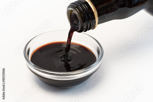 Pouring  Balsamic Vinegar into an Ingredient Bowl