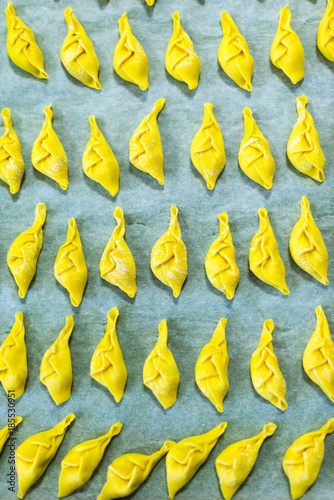 Preparing stuffed pasta tortelli con la coda in Piacenza, Italy