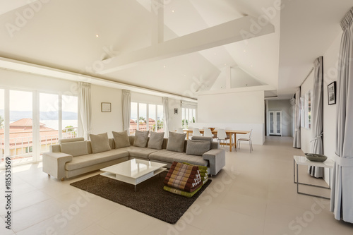 Luxury villa living room interior in white color © Annatamila