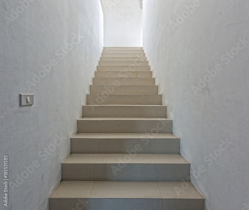 White staircase in light villa interior