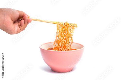 Instant noodles and cup isolated on white background.Instant noodles for people Do not like to eat vegetables.Instant noodles in black cup on white background.