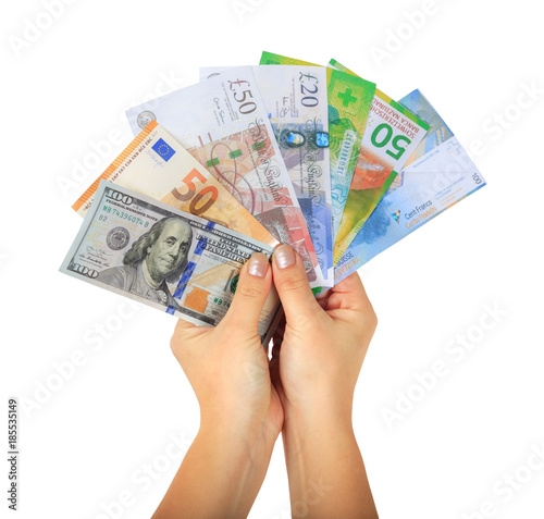 Female hands holding different money paper banknotes