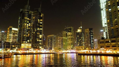 Wallpaper Mural Dubai downtown at night reflected in water. City at night, panoramic scene of downtown reflected in water, Dubai. Dubai downtown at night with reflection in water, modern design of new city Torontodigital.ca