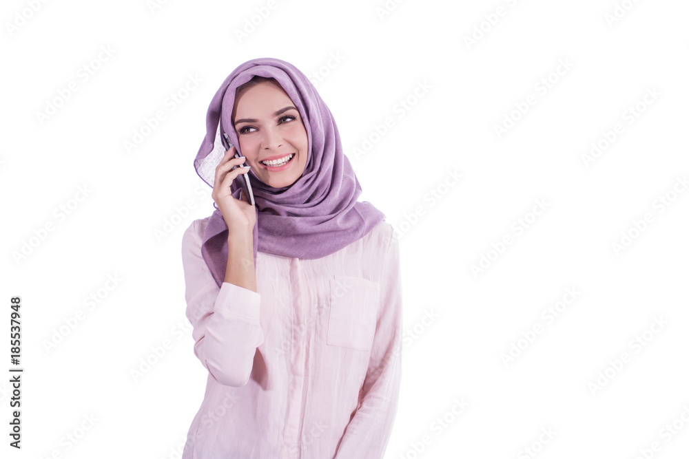 beautiful woman wearing hijab talking on mobile phone beautiful woman wearing hijab talking on mobile phone