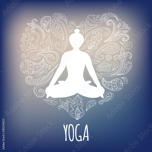 Yoga logo. Girl practicing Lotus pose - Padmasana. Heart shaped paisley ornament. Blue background.