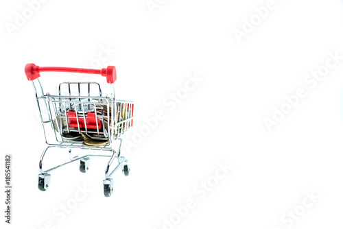 shopping cart with coins isolated