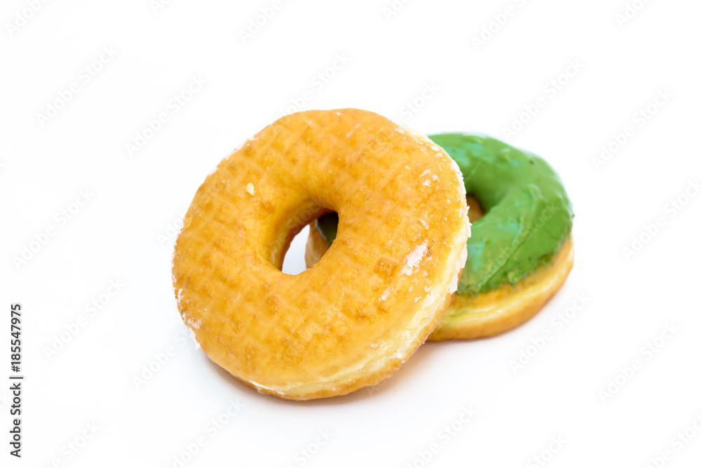 Brown and green glazed donut isolated on white background Brown and green glazed donut isolated on white background