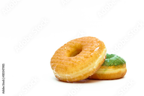 Brown and green glazed donut isolated on white background