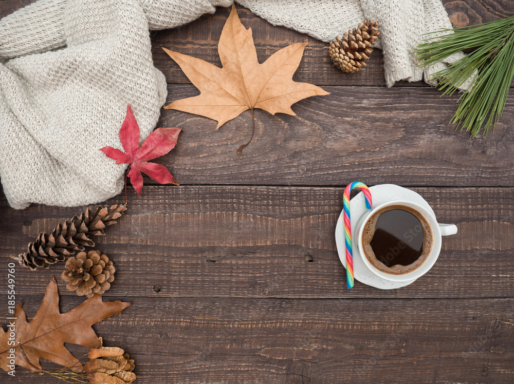 Hot coffee and colorful candy on a wooden table Hot coffee and colorful candy on a wooden table