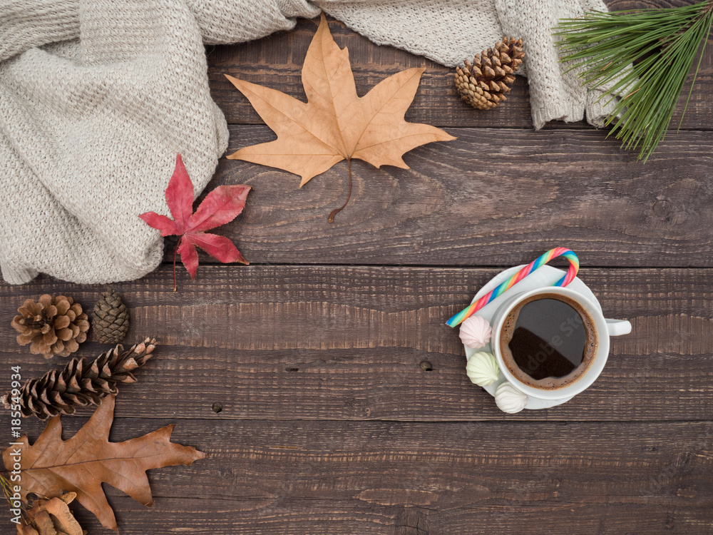 Hot coffee, bise and colorful candy on a wooden table Hot coffee, bise and colorful candy on a wooden table