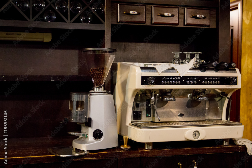 industrial coffee machine and coffee grinder in cafe on table Photos |  Adobe Stock