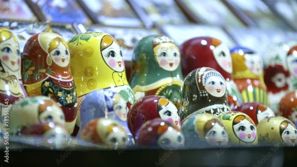 Many beautiful colourful wooden dolls at christmas market. Traditional Russian Matryoshkas are folks cultural symbol of Russia. Many beautiful colourful wooden dolls at christmas market. Traditional Russian Matryoshkas are folks cultural symbol of Russia.