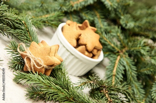 Gingerbread Cookie. Small stars. New Year. Fir branch