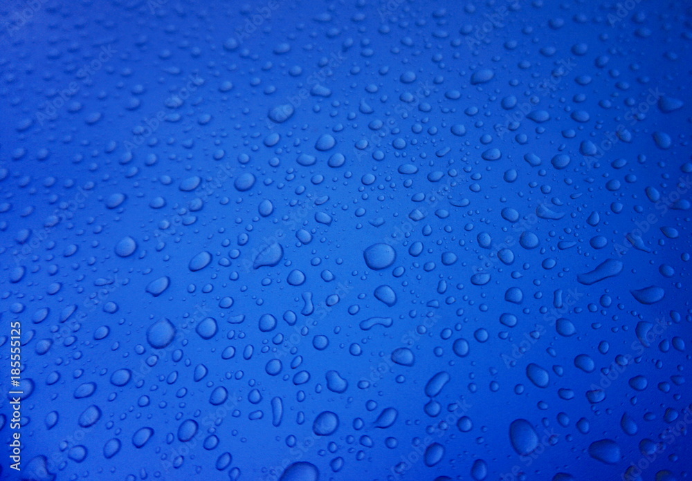 Rain drops on blue