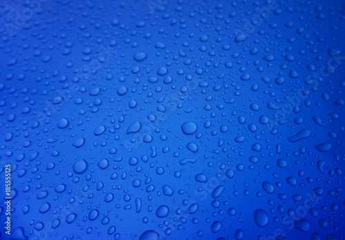 Rain drops on blue